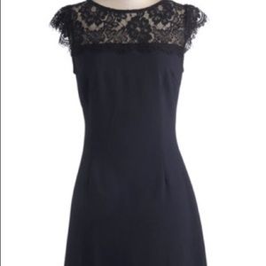 Elegant fitted navy sheath dress