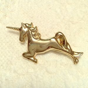 Vintage Light gold tone unicorn brooch pin