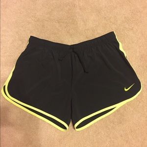 Black and yellow nike shorts