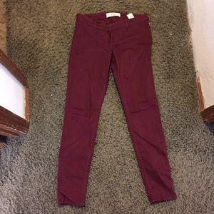 Burgundy skinny jeans