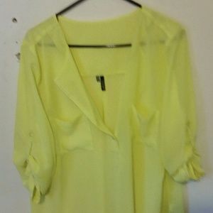 Bright yellow sheer top