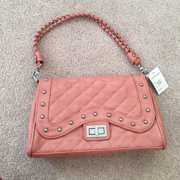 Studded pink quilted handbag