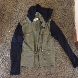 Green army jacket with black sleeves