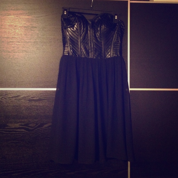 Form fitting strapless leather dress