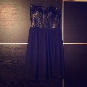 Form fitting strapless leather dress