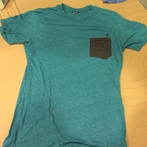 Volcom T-shirt with pocket on chest.