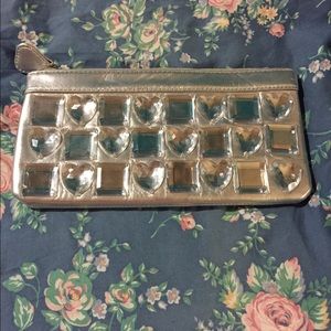 Silver heart clutch bag