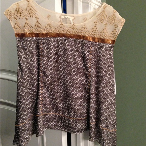Flowy top worn as maternity.