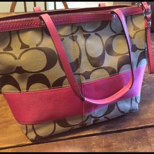 Like new Coach purse pink lining.