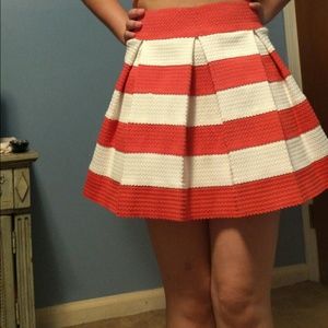 Pink and white striped skirt.