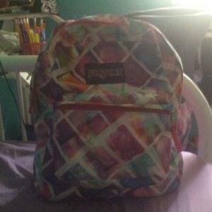 multi colored jansport backpack 🌹
