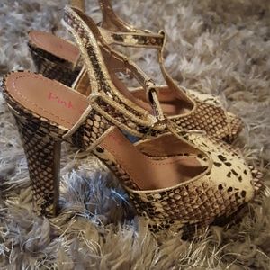 Snake skin appearance high heels.
