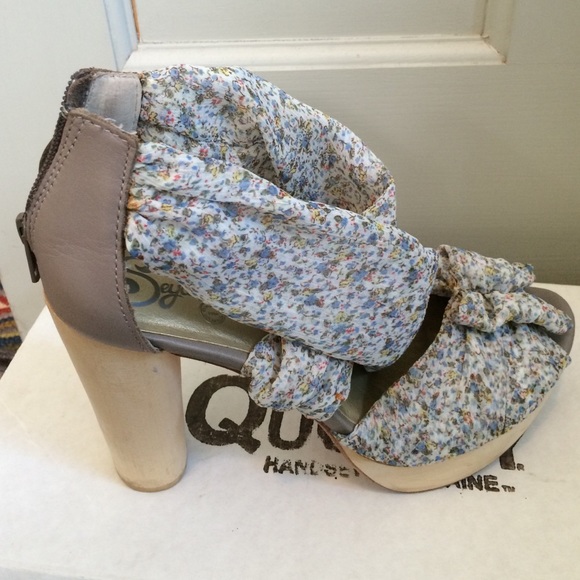 4 in wooden heels. Sheer floral fabric