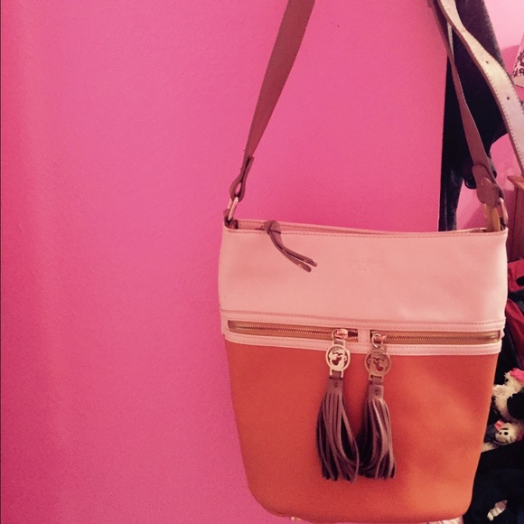 Orange and cream colored bag