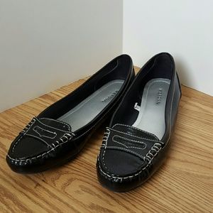 Black loafers, shiny material, very stylish