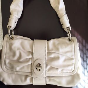 Pearl color coach small handbag