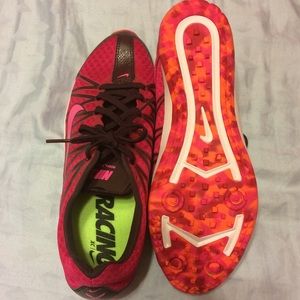 Pink Nike racing shoes