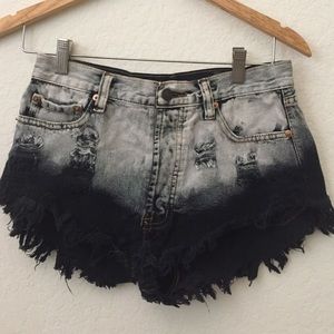 Distressed ombré black shorts