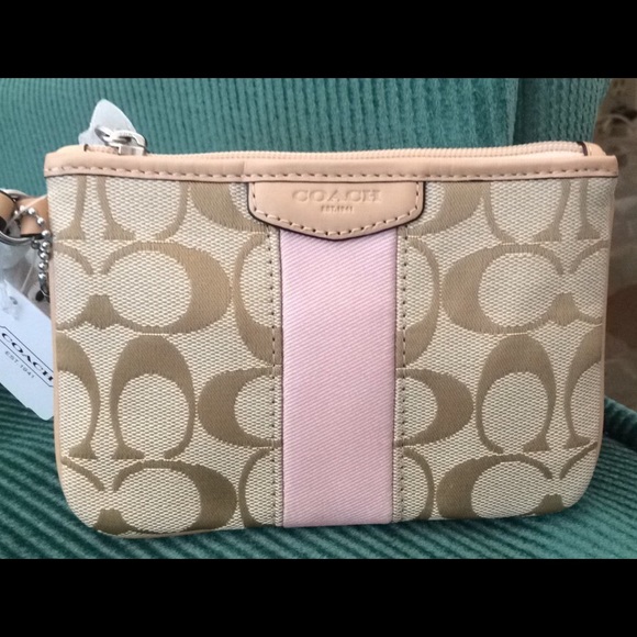 Coach tan and pink wristlet