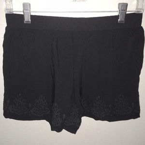 Black embroidered elastic waist shorts