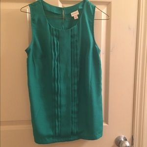 Kelly green sleeveless blouse