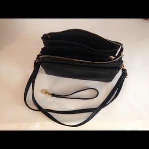 Black multi pocket handbag