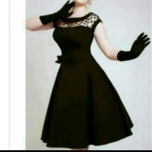 This is an original Tatyana Black Retro Dress