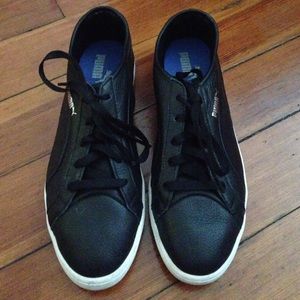 Puma black leather sneakers with white bottoms