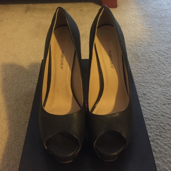 Black Peep toe high heels.