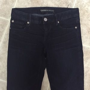Never worn DARK express skinnies. (Size 0)