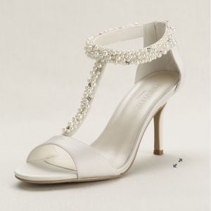 Pearl and crystal encrusted T-strap wedding heels.