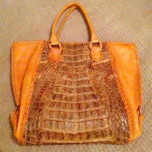 Authentic caiman tote w/ calf skin leather sides.
