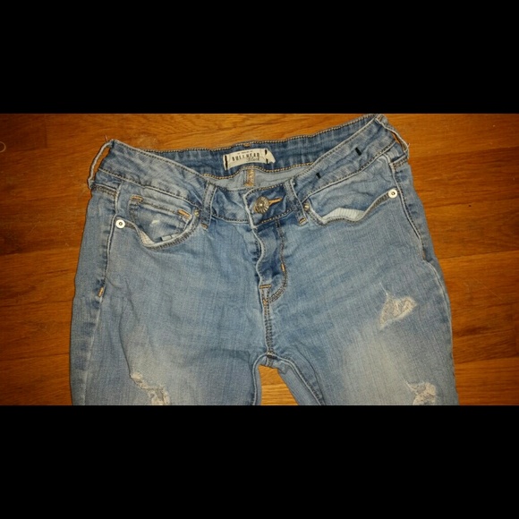 Baggy torn light blue jeans