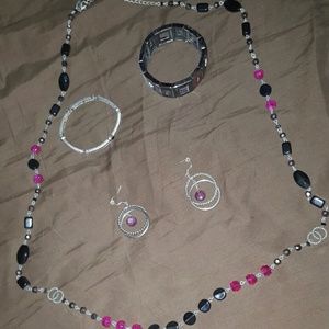 Necklace, two bracelets, and set of earrings