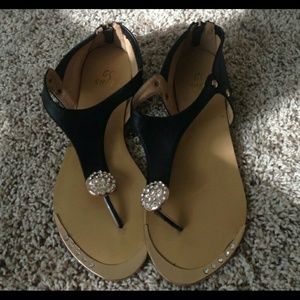 Like new Black sandals with zipper backs.