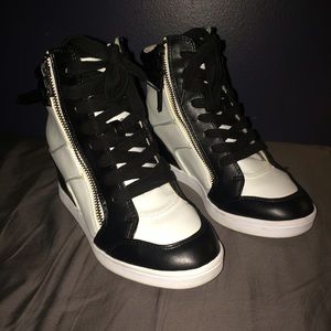 Black and white sneaker wedges.