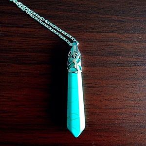 Turquoise point on sterling silver necklace