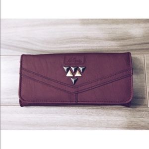 Volcom - burgundy wallet with stud accents