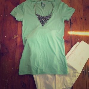 Mint colored Nollie v-neck tee shirt