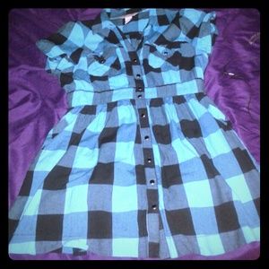 I am selling a short turquoise and black dress