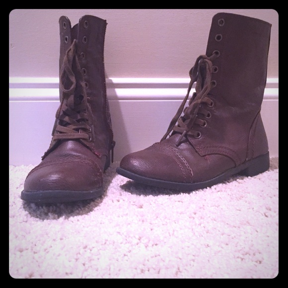 Brown lace up combat boots with zipper