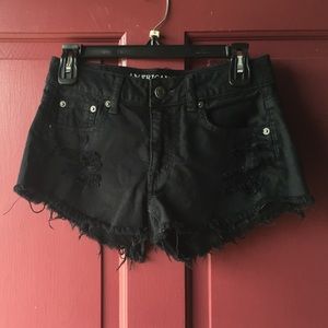 Black ripped shorts