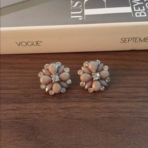 Tan flower stud earrings with cubic zirconia