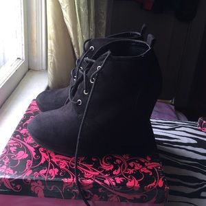 Black bootie wedges.