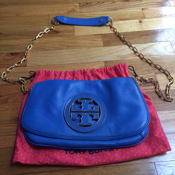 Tory Burch cross body and clutch convertible.