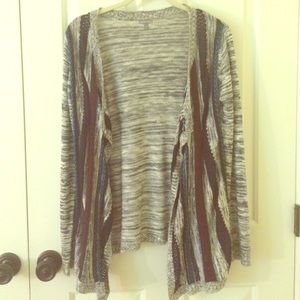 gray sweater with maroon and blue stripes