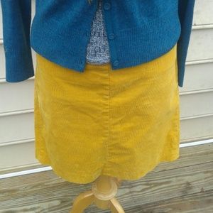 Gold corduroy skirt.