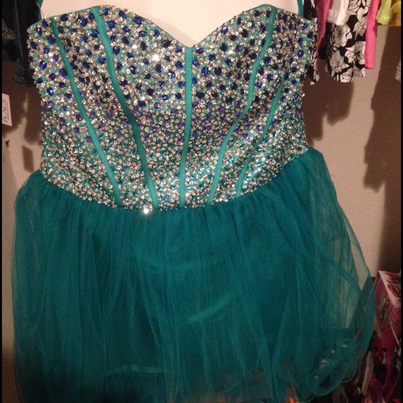 Short teal custom made formal dress.