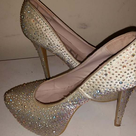 White stiletto rhinestone pumps