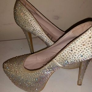 White stiletto rhinestone pumps